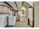 The unfinished basement includes a washer, dryer, and water heater hookups for added functionality at 3470 N Kenwood Ave, Indianapolis, IN 46208