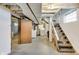 The unfinished basement offers laundry hookups, a staircase, and an egress window for convenience at 3470 N Kenwood Ave, Indianapolis, IN 46208