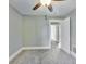 Neutral bedroom features plush carpeting and ample natural light, creating a serene atmosphere at 3470 N Kenwood Ave, Indianapolis, IN 46208