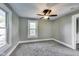 Cozy bedroom with neutral color walls and plush carpeting at 3470 N Kenwood Ave, Indianapolis, IN 46208