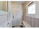 Inviting entryway features bench seating, coat hooks, and stylish flooring at 3470 N Kenwood Ave, Indianapolis, IN 46208