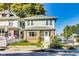 Charming two-story home featuring a brick foundation and light blue siding at 3470 N Kenwood Ave, Indianapolis, IN 46208