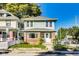 Charming two-story home featuring a brick foundation and light blue siding at 3470 N Kenwood Ave, Indianapolis, IN 46208