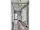 Hallway showcases modern flooring and neutral wall paint at 3470 N Kenwood Ave, Indianapolis, IN 46208
