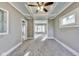 Bright living room with coffered ceilings, neutral walls, and plush carpet at 3470 N Kenwood Ave, Indianapolis, IN 46208