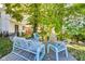 Inviting outdoor patio with comfortable seating, perfect for relaxing and entertaining guests at 3470 N Kenwood Ave, Indianapolis, IN 46208