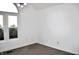 Bright bedroom with plush carpet, white walls and a large window for natural light at 3513 Berkdale Dr, Columbus, IN 47203