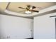 A large bedroom featuring a decorative ceiling, fan, and neutral walls at 3513 Berkdale Dr, Columbus, IN 47203