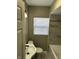 This bathroom features a new toilet, sink, and shower-tub combo with new tile at 3521 N Rural St, Indianapolis, IN 46218