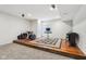 Spacious basement featuring hardwood flooring and musical instruments creating a versatile living space at 3645 Conifer Dr, Zionsville, IN 46077