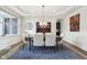 Cozy dining area featuring a chandelier, decorative rug, and stylish furniture at 3645 Conifer Dr, Zionsville, IN 46077