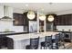 Stylish kitchen features a large island with seating, stainless appliances, and ample counter space at 3645 Conifer Dr, Zionsville, IN 46077