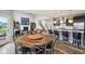 Open-concept living space with modern kitchen, dining area, and comfortable seating at 3645 Conifer Dr, Zionsville, IN 46077
