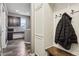 Mudroom with built-in storage, leading to kitchen and home office at 3645 Conifer Dr, Zionsville, IN 46077