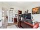 Bright office space with wood floors, dark wood furniture, and a decorative glass door at 3645 Conifer Dr, Zionsville, IN 46077