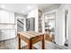 Bright kitchen featuring white cabinets, stainless steel appliances, and a butcher block island at 3652 N Delaware St, Indianapolis, IN 46205