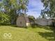 View of spacious backyard featuring lush greenery at 428 E Trevor St, Brownsburg, IN 46112