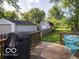 View of backyard area featuring a patio, grill and outdoor seating at 428 E Trevor St, Brownsburg, IN 46112