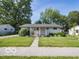 Charming single-story home featuring a well-manicured lawn and welcoming entrance at 428 E Trevor St, Brownsburg, IN 46112