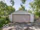 View of a garage with a large door at 428 E Trevor St, Brownsburg, IN 46112