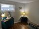 Cozy room featuring unique decor, wood flooring, and ample natural light at 428 E Trevor St, Brownsburg, IN 46112
