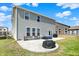 Backyard of home with patio, outdoor seating, covered grill, and open green space at 4345 Maize Ln, Whitestown, IN 46075