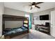 Bedroom with a bunk bed, a television, and a small window at 4345 Maize Ln, Whitestown, IN 46075