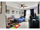 Bright bedroom featuring superhero decor, neutral walls, and a ceiling fan at 4345 Maize Ln, Whitestown, IN 46075