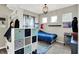 Cozy bedroom offering ample storage space, a comfortable bed, and soft natural light from the windows at 4345 Maize Ln, Whitestown, IN 46075