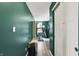 Home gym space with exercise equipment, a sliding door, and green accent walls at 4345 Maize Ln, Whitestown, IN 46075