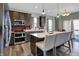 Bright kitchen featuring stainless steel appliances, a breakfast bar, and modern lighting fixtures at 4345 Maize Ln, Whitestown, IN 46075