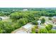 Aerial view of a community pool, residential buildings and surrounding green space at 4814 Lynton Ct, Indianapolis, IN 46254