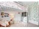 Charming bedroom with a unique loft bed setup, complemented by stylish decor and a cozy seating area at 4814 Lynton Ct, Indianapolis, IN 46254