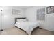 Cozy bedroom with a comfortable bed, soft lighting, and a window offering natural light at 4814 Lynton Ct, Indianapolis, IN 46254