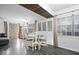 Bright dining area with a round table, modern decor, and ample natural light, creating a welcoming atmosphere at 4814 Lynton Ct, Indianapolis, IN 46254