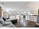Bright open-concept space featuring a living area with a comfortable sofa, a dining area, and a modern kitchen at 4814 Lynton Ct, Indianapolis, IN 46254