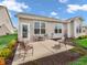 Cozy back patio with outdoor seating, perfect for relaxing and enjoying the view at 4993 Silverbell Dr, Plainfield, IN 46168