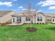 Expansive backyard with well-maintained lawn and charming patio area at 4993 Silverbell Dr, Plainfield, IN 46168