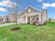 Charming home with well-manicured lawn and inviting front porch at 4993 Silverbell Dr, Plainfield, IN 46168