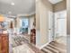 Hallway features wood floors with multiple doorways leading to various rooms at 4993 Silverbell Dr, Plainfield, IN 46168