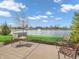 Serene water view with fountain feature from the patio at 4993 Silverbell Dr, Plainfield, IN 46168