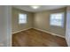 Bedroom offering hardwood floors and two windows providing great light at 5105 Manning Rd, Indianapolis, IN 46228