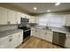 Updated kitchen featuring granite countertops and stainless steel appliances at 5105 Manning Rd, Indianapolis, IN 46228