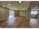 Open floor plan with new floors connecting the living room to kitchen at 5105 Manning Rd, Indianapolis, IN 46228