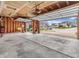 Spacious garage with open doors showcasing the neighborhood and outdoor access at 5524 Cherry Blossom Ct, Indianapolis, IN 46237