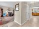 Spacious hallway featuring ceramic tile and providing access to the living room and kitchen at 5524 Cherry Blossom Ct, Indianapolis, IN 46237