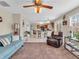 Open living room showcases seamless flow to kitchen and dining, with comfortable seating at 5524 Cherry Blossom Ct, Indianapolis, IN 46237