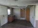 Kitchen featuring laminate floors, and essential fixtures ready for a remodel at 5961 N 200 W, Columbus, IN 47201