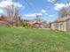 Expansive backyard with patio and garage, ideal for Gathering activities and outdoor enjoyment at 6347 St Joe Dr, Indianapolis, IN 46217