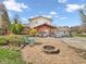 The backyard patio features a cozy gazebo and fire pit area, perfect for outdoor gatherings at 6347 St Joe Dr, Indianapolis, IN 46217